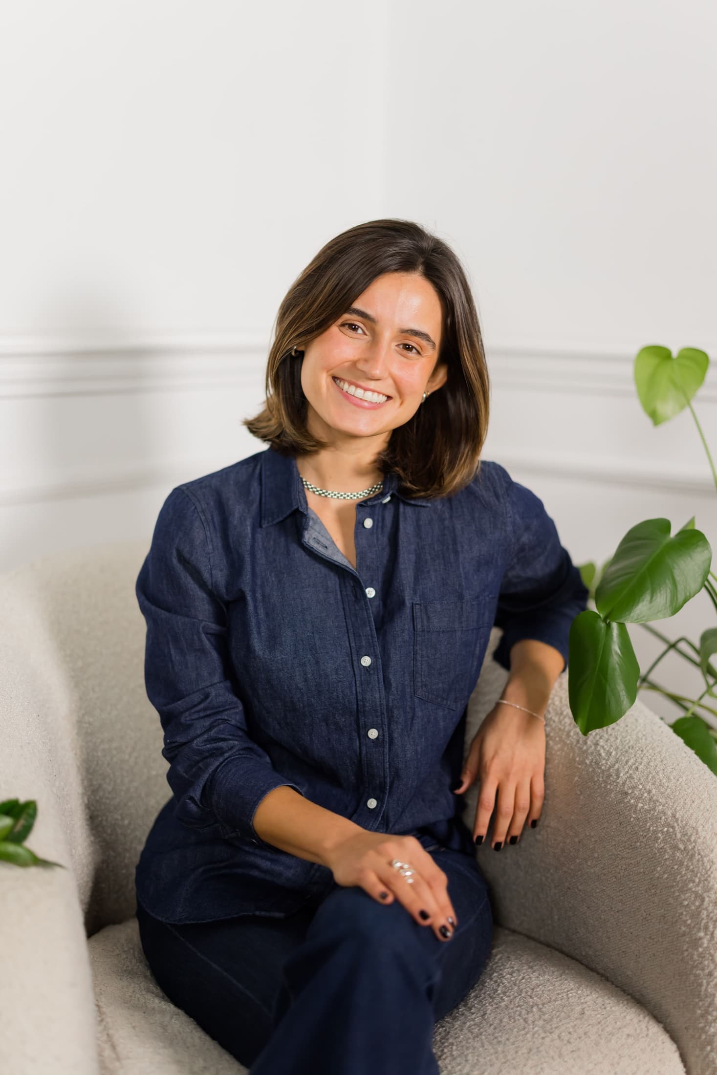 Rebecca Fernandez seated in a bright, welcoming space